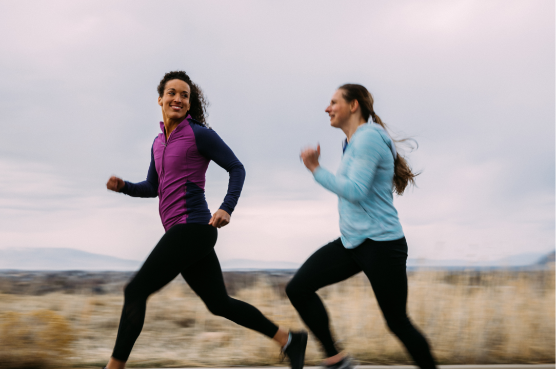 2 Women Running one Mixed Race